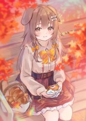  1girl animal_ears autumn_leaves basket bench blunt_bangs blurry blush bone_hair_ornament braid braided_sidelocks bread brown_eyes brown_hair brown_shirt center_frills check_food closed_mouth commentary depth_of_field dog_ears dog_girl double-parted_bangs feet_out_of_frame floral_print food food_request frilled_skirt frills gold_trim hair_between_eyes hair_intakes hair_ornament highres holding holding_food holding_napkin holding_sandwich hololive inugami_korone inugami_korone_(street) leaf long_hair long_sleeves looking_at_viewer missing_headwear no_jacket puffy_long_sleeves puffy_sleeves red_skirt sandwich shirt shirt_tucked_in sidelocks sitting skirt sleeves_past_wrists smile solo takaya_naru untranslatable_commentary virtual_youtuber 