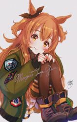  1girl :> animal_ears blurry blush bomber_jacket boots brown_boots brown_ribbon brown_thighhighs commentary curled_up depth_of_field ear_ribbon fur_trim hair_between_eyes head_tilt highres horse_ears horse_girl izuky_(izz_qt) jacket long_hair looking_at_viewer mayano_top_gun_(scramble_zone)_(umamusume) mayano_top_gun_(umamusume) on_floor orange_eyes orange_hair raised_eyebrows ribbon shorts simple_background sleeves_past_wrists solo thigh-highs two_side_up umamusume white_background white_shorts 