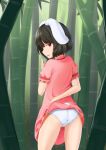  1girl animal_ears ass bamboo bamboo_forest black_hair bunny_tail clothes_lift dress dress_lift flashing forest from_behind hand_to_own_mouth highres inaba_tewi kubure lifted_by_self looking_at_viewer looking_back nature outdoors panties pink_dress rabbit_ears red_eyes short_hair short_sleeves smile solo tail thighs touhou underwear 