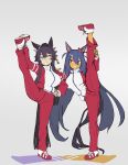  2girls absurdres animal_ears bandaid bandaid_on_nose bangs black_hair commentary_request dark_blue_hair ear_ornament eye_contact full_body grin hair_between_eyes hair_ornament hair_tie hairclip hand_on_another&#039;s_shoulder hand_on_hip hand_on_own_leg highres hishi_amazon_(umamusume) holding_own_foot horse_ears horse_girl horse_tail jacket long_hair long_sleeves looking_at_another mafuyu_no_mo multiple_girls narita_brian_(umamusume) pants red_eyes red_scrunchie red_track_suit scrunchie shoes sidelocks simple_background smile sneakers split standing standing_on_one_leg standing_split tail tan tied_hair track_jacket track_pants track_suit umamusume very_long_hair yellow_eyes 