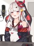  1girl :d bare_shoulders bell black_kimono blurry blurry_background blush chair collarbone depth_of_field double_bun fang gradient_hair hair_bell hair_ornament highres hololive horns japanese_clothes jingle_bell kimono long_hair mask mask_on_head microphone mizuki_ryuu mouse_(computer) mousepad_(object) multicolored_hair nakiri_ayame off_shoulder office_chair on_chair oni oni_horns oni_mask open_mouth red_eyes redhead silver_hair sitting smile solo table upper_body upper_teeth very_long_hair virtual_youtuber 