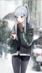  1girl absurdres agent_416_(girls_frontline) bangs blue_hair blue_pants brown_gloves eating eyebrows_visible_through_hair feet_out_of_frame food girls_frontline gloves green_eyes green_jacket highres hk416_(girls_frontline) holding holding_food jacket long_hair looking_down open_clothes open_jacket pants ponytail seorang shirt simple_background snowflake_background snowflakes solo standing tom_clancy&#039;s_the_division white_shirt 