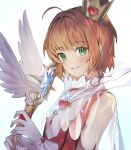 1girl ahoge brown_hair cardcaptor_sakura crown dress gloves green_eyes heart highres holding kinomoto_sakura looking_at_viewer magical_girl mini_crown parted_lips posom red_dress see-through simple_background smile solo upper_body white_background white_gloves 