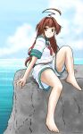  1girl aaoi ahoge blue_sky brown_eyes brown_hair clouds day green_sailor_collar horizon huge_ahoge kantai_collection kuma_(kancolle) long_hair neckerchief ocean outdoors red_neckwear rock sailor_collar school_uniform serafuku short_sleeves shorts sitting sky solo white_shorts 