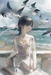  1girl absurdres background_text bangs bare_shoulders beach bird black_hair breasts closed_mouth clouds cloudy_sky commentary_request dress english_commentary english_text expressionless eyebrows frilled_dress frills grey_eyes hair_ribbon highres leaning leaning_back leaning_on_rail long_hair long_ribbon looking_to_the_side ocean original outdoors railing ramp ribbon sand scenery seagull shiny shiny_hair sidelocks sky small_breasts solo standing sundress water waves white_bird white_dress white_ribbon zygocactus 