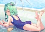 1girl ass back bangs bare_shoulders barefoot bird blue_swimsuit blush breasts cellphone chick commentary_request double_bun green_hair hair_ornament hair_ribbon hololive legs looking_at_viewer looking_back lying on_stomach one-piece_swimsuit parted_lips phone piyoko_(uruha_rushia) poolside red_eyes ribbon shimokirin short_hair shoulder_blades sidelocks skull_hair_ornament swimsuit the_pose uruha_rushia virtual_youtuber