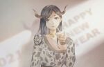  1girl absurdres black_eyes black_hair black_nails bubble_tea choker ckr4.8_(shiren) cup disposable_cup drink drinking drinking_straw english_commentary happy_new_year highres holding holding_cup horns long_sleeves looking_at_viewer new_year original print_shirt shadow shirt smile 