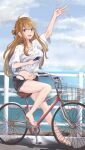  1girl absurdres ahoge bangs bicycle blue_eyes breasts brown_hair cellphone earrings full_body ground_vehicle highres holding holding_phone idolmaster idolmaster_million_live! izuminnu jewelry long_hair looking_at_viewer medium_breasts midriff nail_polish navel necklace ocean open_mouth phone riding_bicycle road sandals shirt sketch smartphone smile solo swept_bangs swimsuit swimsuit_under_clothes tied_shirt toenail_polish toenails tokoro_megumi waving white_shirt 
