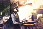  1girl absurdres ahoge animal_ears apron bangs black_apron black_hair blurry blurry_background blurry_foreground blush cafe chain coffee_mug collared_shirt commentary_request cowboy_shot cup depth_of_field ear_tag eyebrows_visible_through_hair eyes_visible_through_hair grey_shirt hair_between_eyes highres holding holding_tray horse_ears horse_girl indoors kagerou_(gigayasoma) long_hair long_sleeves looking_at_viewer manhattan_cafe_(umamusume) mug necktie plant potted_plant saucer shirt sideways_glance solo standing table tray umamusume very_long_hair wooden_chair yellow_eyes yellow_neckwear 