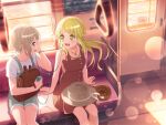 2girls aoba_moca bang_dream! blonde_hair blush earphones long_hair necklace official_art open_mouth shirt sitting smile sun_hat sunset train_interior tsurumaki_kokoro yellow_eyes