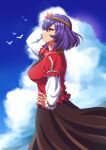 1girl bangs bird blue_sky breasts brown_skirt closed_mouth clouds from_side hair_ornament hand_on_hip highres large_breasts layered_sleeves leaf_hair_ornament long_skirt long_sleeves mirror murasaki_tsutsuji outdoors purple_hair purple_nails red_eyes red_shirt rope shirt short_hair short_over_long_sleeves short_sleeves skirt sky smile solo standing touhou wind yasaka_kanako