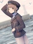  1girl bird blurry blurry_background brown_eyes brown_hair clothes_writing dress flat_chest hat highres honmakaina_kudou kantai_collection lighthouse long_sleeves outdoors sailor_dress sailor_hat short_hair solo standing z3_max_schultz_(kancolle) 