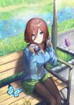  1girl absurdres blue_cardigan blue_eyes blue_sweater bug butterfly cardigan closed_mouth eyebrows_visible_through_hair eyes_visible_through_hair go-toubun_no_hanayome green_skirt hair_between_eyes headphones headphones_around_neck highres horu77426407 insect long_hair long_sleeves nakano_miku outdoors redhead sitting sitting_on_bench skirt smile solo sweater 