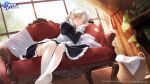  1girl apron azur_lane bangs black_dress blonde_hair blush braid breasts chain collar couch curtains dress dutch_angle eyebrows_visible_through_hair eyes_visible_through_hair french_braid hair_over_one_eye half-closed_eye highres juliet_sleeves laundry_basket leaning_to_the_side light_rays long_hair long_sleeves looking_at_viewer maid maid_headdress medium_breasts metal_collar nima_(niru54) no_shoes official_art on_couch one_eye_closed parted_lips puffy_sleeves sheffield_(azur_lane) sunbeam sunlight thigh-highs towel waking_up white_apron white_legwear white_towel window yellow_eyes 