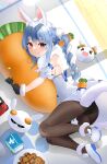  1girl absurdres animal_ears ass black_gloves black_legwear blue_hair braid breasts carrot carrot_pillow cookie food gloves highres hololive looking_at_viewer meteor_(yamashou) nintendo_switch pantyhose rabbit_ears red_eyes small_breasts thigh_strap usada_pekora white_footwear 