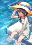  1girl black_hair blue_bow bow braid flower hair_bow hair_ribbon hat hat_bow hat_flower highres kantai_collection kitakami_(kancolle) okitsugu open_mouth ribbon side_braid single_braid sitting smile soaking_feet solo sun_hat tress_ribbon violet_eyes 