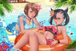  2girls beach black_hair brown_hair crazy_straw criss-cross_halter drinking_straw exlic feet_out_of_frame flower gloria_(pokemon) hair_flower hair_ornament halterneck heart_straw innertube looking_at_viewer marnie_(pokemon) midriff multiple_girls navel pokemon pokemon_(game) pokemon_swsh swimsuit water wristband 