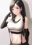  1girl absurdres arm_guards bangs bare_shoulders black_gloves black_hair blush breasts collarbone commentary crop_top earrings elbow_gloves eyebrows_visible_through_hair final_fantasy final_fantasy_vii final_fantasy_vii_remake fingerless_gloves gloves hand_in_hair highres jewelry long_hair looking_at_viewer medium_breasts midriff navel red_eyes revision solo sports_bra suspenders tank_top tifa_lockhart tooku0 upper_body white_tank_top 