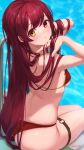  1girl absurdres arms_up ass back bare_arms bare_shoulders bikini blush breasts from_behind hands_in_hair heterochromia highres hololive houshou_marine kanoe_(tatsukanoe) long_hair looking_at_viewer looking_back medium_breasts o-ring orange_eyes pool red_bikini red_eyes redhead sideboob signature sitting solo swimsuit thigh_strap very_long_hair virtual_youtuber water 