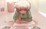  1boy arm_support bangs blonde_hair blush dangan_ronpa_(series) dangan_ronpa_another_episode:_ultra_despair_girls despair_sauce drawing eyebrows_visible_through_hair green_shirt holding kemuri_jatarou long_sleeves lying paper pov shiny shiny_hair shirt short_hair solo_focus 