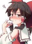  1girl bare_shoulders blush bow brown_eyes brown_hair detached_sleeves eating eyebrows_visible_through_hair food food_on_face hair_between_eyes hair_bow hair_tubes hakurei_reimu highres holding holding_food long_hair nontraditional_miko parted_lips red_bow ribbon-trimmed_sleeves ribbon_trim sidelocks simple_background solo touhou white_background wide_sleeves yutamaro 