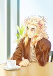  1boy absurdres blonde_hair brown_jacket casual closed_mouth collarbone cup dog_tags grey_shirt head_rest highres jacket kimetsu_no_yaiba long_hair long_sleeves looking_to_the_side male_focus multicolored_hair open_clothes open_jacket redhead remsor076 rengoku_kyoujurou shirt sitting smile solo table teacup two-tone_hair yellow_eyes 