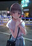  1girl bag bangs blue_skirt blurry blurry_background blush brown_hair chikuwa_(odennabe) closed_mouth handbag hands_together hands_up highres long_hair looking_at_viewer original outdoors palms_together shirt short_sleeves skirt smile solo standing violet_eyes white_shirt 