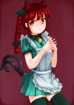  1girl alternate_costume animal_ears apron bangs bell black_legwear bow braid cat_ears cat_tail closed_mouth cowboy_shot dress eyebrows_visible_through_hair green_bow green_dress hair_bow highres kaenbyou_rin looking_at_viewer maid medium_hair multiple_tails neck_bell own_hands_together red_background red_eyes red_nails redhead scottie0521 short_sleeves side_braids simple_background smile solo standing tail thigh-highs touhou twin_braids two_tails white_apron 