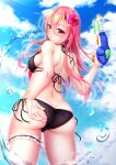  1girl adjusting_clothes adjusting_swimsuit ass back bangs bikini black_bikini blue_sky breasts butt_crack clouds commentary_request day eyebrows_visible_through_hair flower from_behind hair_between_eyes hair_flower hair_ornament highres hiro_(725611) holding holding_water_gun leg_garter long_hair looking_at_viewer medium_breasts ocean original outdoors parted_lips pink_hair shochuumimai shoulder_blades sideboob sidelocks sky solo standing swimsuit thighs trefoil water_drop water_gun wet yellow_eyes 