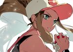  1girl baseball_cap black_vest black_wristband blurry brown_hair commentary eyelashes floating_hair from_side grey_eyes hat high_ponytail highres hilda_(pokemon) holding holding_poke_ball long_hair parted_lips pink_headwear poke_ball poke_ball_(basic) pokemon pokemon_(game) pokemon_bw sidelocks solo two-tone_headwear upper_body vest wristband yon44141 