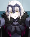  1girl ahoge blonde_hair blush breasts chain fate/grand_order fate_(series) feather_trim feathered_cape hasebe_akira headpiece highres jeanne_d&#039;arc_(alter)_(fate) jeanne_d&#039;arc_(fate)_(all) looking_at_viewer medium_breasts parted_lips short_hair solo wall_slam yellow_eyes 