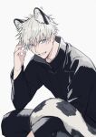  1boy animal_ear_fluff animal_ears black_jacket black_pants blue_eyes cat_ears cat_tail coyucom gojou_satoru hand_up high_collar jacket jujutsu_kaisen male_focus pants short_hair simple_background sitting smile solo tail teeth twitter_username white_background white_hair 