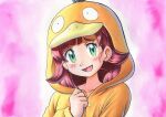  1girl :d bangs blush brown_hair buttons chloe_(pokemon) collarbone commentary_request cosplay eyelashes green_eyes hair_down hand_up highres hood hood_up long_hair looking_at_viewer oka_mochi onesie open_mouth pink_background pokemon pokemon_(anime) pokemon_swsh_(anime) psyduck psyduck_(cosplay) smile solo tongue traditional_media 