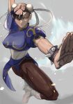  1girl black_legwear bracelet brown_eyes chinese_clothes chun-li double_bun fighting_stance highres jewelry looking_at_viewer muscular muscular_female spiked_bracelet spikes street_fighter thighs 