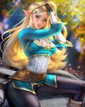  1girl ayya_sap black_pants blonde_hair blue_eyes blue_shirt braid breasts hands_in_hair highres long_hair looking_at_viewer medium_breasts pants pinup_(style) pointy_ears shirt solo the_legend_of_zelda the_legend_of_zelda:_breath_of_the_wild undershirt 