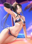  1girl arm_support arm_up armlet armpits bangs bare_shoulders beach beach_umbrella bikini black_bikini black_choker black_hair breasts choker collarbone day eyeshadow facial_mark fate/grand_order fate_(series) floral_print forehead_mark highres innertube kariza long_hair looking_at_viewer makeup medium_breasts navel orange_eyes outdoors parted_bangs parted_lips print_bikini reclining sand side_ponytail smile solo stomach swimsuit tassel umbrella under_boob ushiwakamaru_(avenger)_(fate) ushiwakamaru_(fate) 