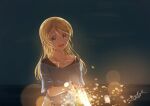  1girl artist_name ayase_eli bangs blonde_hair blue_eyes blue_shirt blurry bokeh commentary depth_of_field fireworks holding horizon jewelry long_hair looking_at_viewer love_live! necklace night night_sky open_mouth shirt short_sleeves signature sky smile solo sparkler suito 