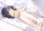  1girl bangs barefoot bed_sheet black_hair commentary_request dress eyebrows_visible_through_hair frilled_dress frilled_pillow frills full_body grin hayashi_kewi holding idolmaster idolmaster_shiny_colors knees_up looking_at_viewer low_twintails lying morino_rinze on_side pillow puffy_short_sleeves puffy_sleeves red_eyes short_sleeves short_twintails smile soles solo twintails white_dress 