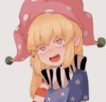  1girl american_flag_dress bangs blonde_hair bright_pupils clownpiece commentary_request doro_au eyebrows_visible_through_hair fang hair_between_eyes hat highres jester_cap light_blush long_hair looking_at_viewer neck_ruff pink_eyes pink_headwear polka_dot_headwear short_sleeves simple_background skin_fang solo star_(symbol) star_print thick_eyebrows touhou white_background white_pupils 