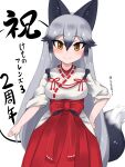 1girl animal_ears aramaru black_hair blush bow commentary_request extra_ears fox_ears fox_girl grey_hair hakama hakama_skirt highres japanese_clothes kemono_friends kemono_friends_3 long_hair looking_at_viewer miko multicolored_hair official_alternate_costume orange_eyes red_bow red_skirt shirt silver_fox_(kemono_friends) silver_hair skirt solo translation_request white_shirt 
