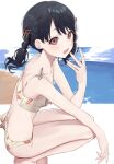  1girl :d bangs bare_arms bare_legs bare_shoulders barefoot beach bikini black_hair blush bow breasts brown_eyes commentary_request day eyebrows_visible_through_hair fangs floral_print from_side fukumaru_koito hair_ornament highres horizon idolmaster idolmaster_shiny_colors looking_at_viewer looking_to_the_side ocean open_mouth print_bikini ribbon sand smile solo spread_legs squatting swimsuit syhan twintails violet_eyes water white_bikini 
