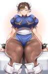  1girl absurdres anagumasan bed boots bracelet breasts brown_eyes chinese_clothes chun-li double_bun highres jewelry large_breasts pantyhose puffy_sleeves sash short_hair sitting spiked_bracelet spikes street_fighter thick_thighs thighs white_background white_footwear 