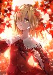  1girl aki_shizuha autumn_leaves backlighting bangs blonde_hair bow branch breasts buttons collarbone collared_shirt hair_ornament hair_over_one_eye highres holding holding_leaf juliet_sleeves leaf leaf_hair_ornament long_sleeves looking_at_viewer medium_hair puffy_sleeves red_bow red_ribbon red_shirt ribbon shironeko_yuuki shirt small_breasts solo touhou upper_body wide_sleeves yellow_eyes 