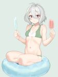  1girl absurdres antenna_hair bangs bikini breasts brown_eyes closed_mouth cushion elf eyebrows_visible_through_hair food green_background grey_hair hair_between_eyes highres holding hoshiya_takahito kokkoro_(princess_connect!) looking_at_viewer navel pointy_ears popsicle princess_connect! short_hair simple_background sitting small_breasts solo stomach swimsuit 