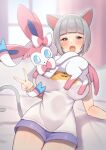  1girl animal_ears arm_support bangs blunt_bangs blurry blush bob_cut breasts character_print commentary_request eichan_(eichanidfi) fang grey_hair half-closed_eyes highres indoors large_breasts open_mouth original pikachu pokemon pokemon_(creature) purple_shorts shiny shiny_skin shirt short_hair short_sleeves shorts sylveon tail tongue v white_shirt 