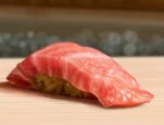  blurry blurry_background bokeh commentary_request depth_of_field english_commentary food food_focus highres meat mixed-language_commentary no_humans original partial_commentary photorealistic rice salmon shiny soraciel still_life 
