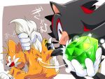  2boys ^^^ animal_ears animal_nose black_hair blue_eyes blush body_fur border brown_background chaos_emerald commentary_request fang fox_boy fox_ears fox_tail from_behind furry furry_male gem gloves hedgehog_ears hedgehog_tail holding holding_gem looking_at_another looking_at_viewer looking_back male_focus misuta710 multicolored_hair multiple_boys multiple_tails open_mouth orange_fur orange_hair outside_border profile redhead shadow_the_hedgehog simple_background sonic_(series) sonic_adventure_2 sonic_the_hedgehog sonic_the_hedgehog_2 sparkle streaked_hair sweat tail tail_grab tails_(sonic) teeth translation_request two-tone_hair wavy_mouth white_border white_gloves white_hair 