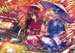  2girls :d architecture blue_eyes blue_flower blue_kimono blurry blurry_background blush bridge brown_hair character_request depth_of_field east_asian_architecture flower forest geta green_sash hair_flower hair_ornament hanikami_kanojo highres holding holding_umbrella holdinig iwhite_socks japanese_clothes kimono leaf long_hair long_sleeves looking_at_another looking_down maple_leaf minazumi_kasane multiple_girls nature obi oil-paper_umbrella piromizu purple_umbrella red_flower red_kimono red_umbrella river rock sash smile squatting stitched tabi umbrella wide_sleeves 