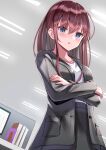  1girl bangs black_jacket black_skirt blue_eyes book breasts brown_hair commentary_request crossed_arms eyebrows_visible_through_hair highres indoors jacket long_hair long_sleeves looking_at_viewer natsuki_(natukituki) office_lady open_clothes open_jacket original parted_lips shirt skirt small_breasts solo white_shirt 