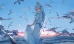  1girl absurdres bangs bird blue_sky blunt_bangs blush clothes_lift clouds day dress dress_lift eyebrows_visible_through_hair hair_ornament highres lize_helesta long_hair looking_at_viewer looking_back nijisanji ocean open_mouth outdoors scenery seagull sen_(sennosenn1127) silver_hair sky solo violet_eyes virtual_youtuber water white_dress 